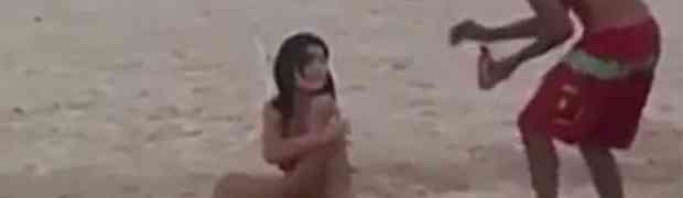 Djevojka se brutalno našalila sa muškarcima na plaži (VIDEO)